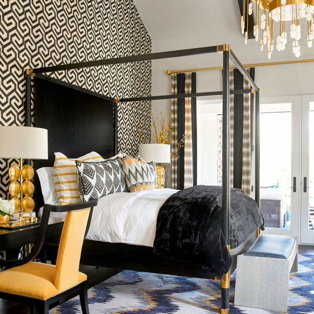 black and white bedroom with gold accents