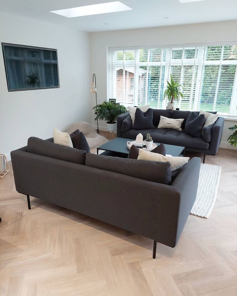 colour scheme for living room with black sofa