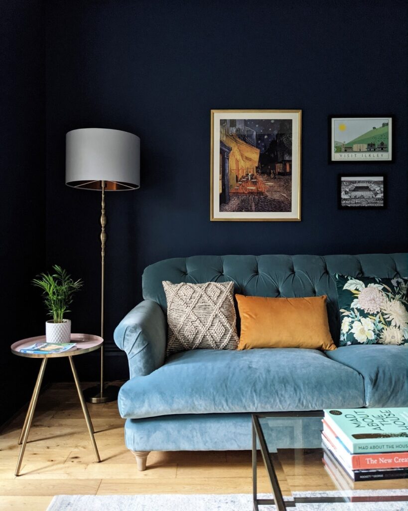 living room design with blue sofa