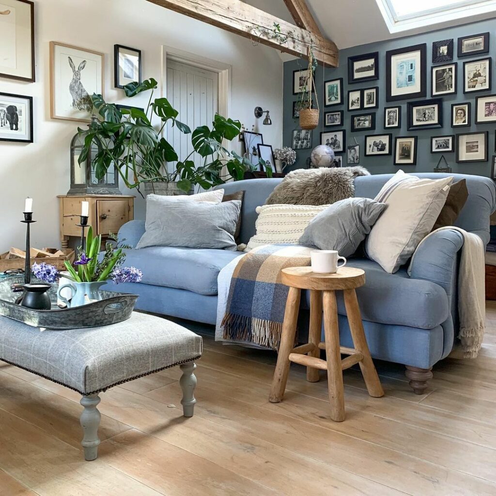 living room with blue velvet sofa
