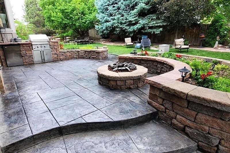 stamped concrete patio with fire pit ideas
