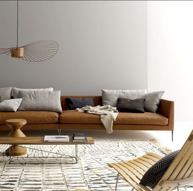 decorating ideas for living room with dark brown sofa and brick fireplace