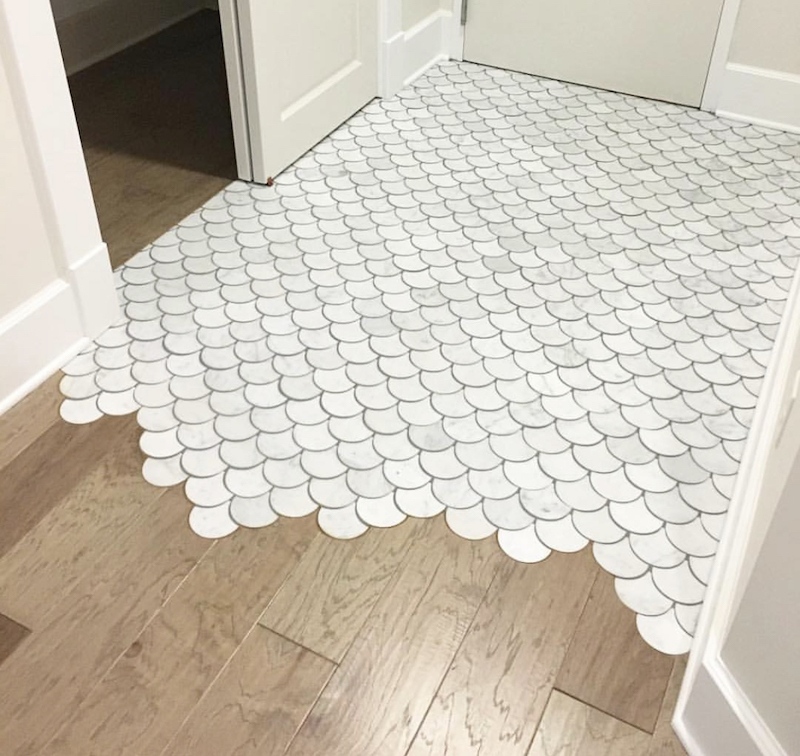 flooring transitions from wood to tile
